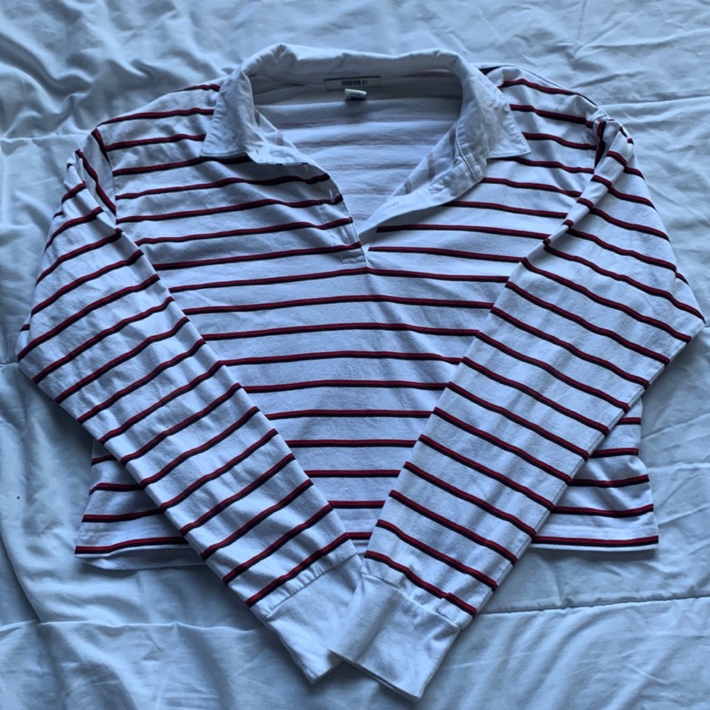 white, red, and black collared long-sleeve